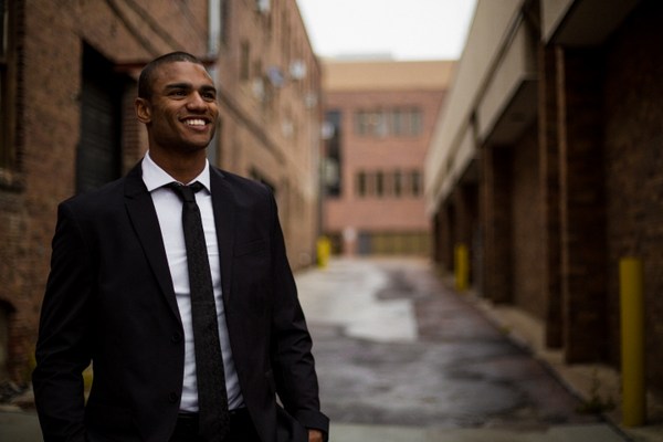 man in suit black tie