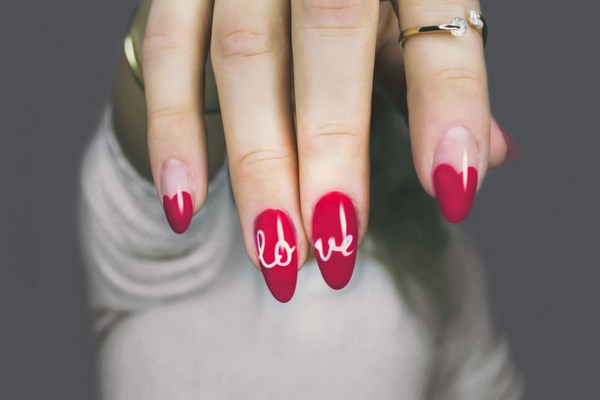 red and white manicured nails